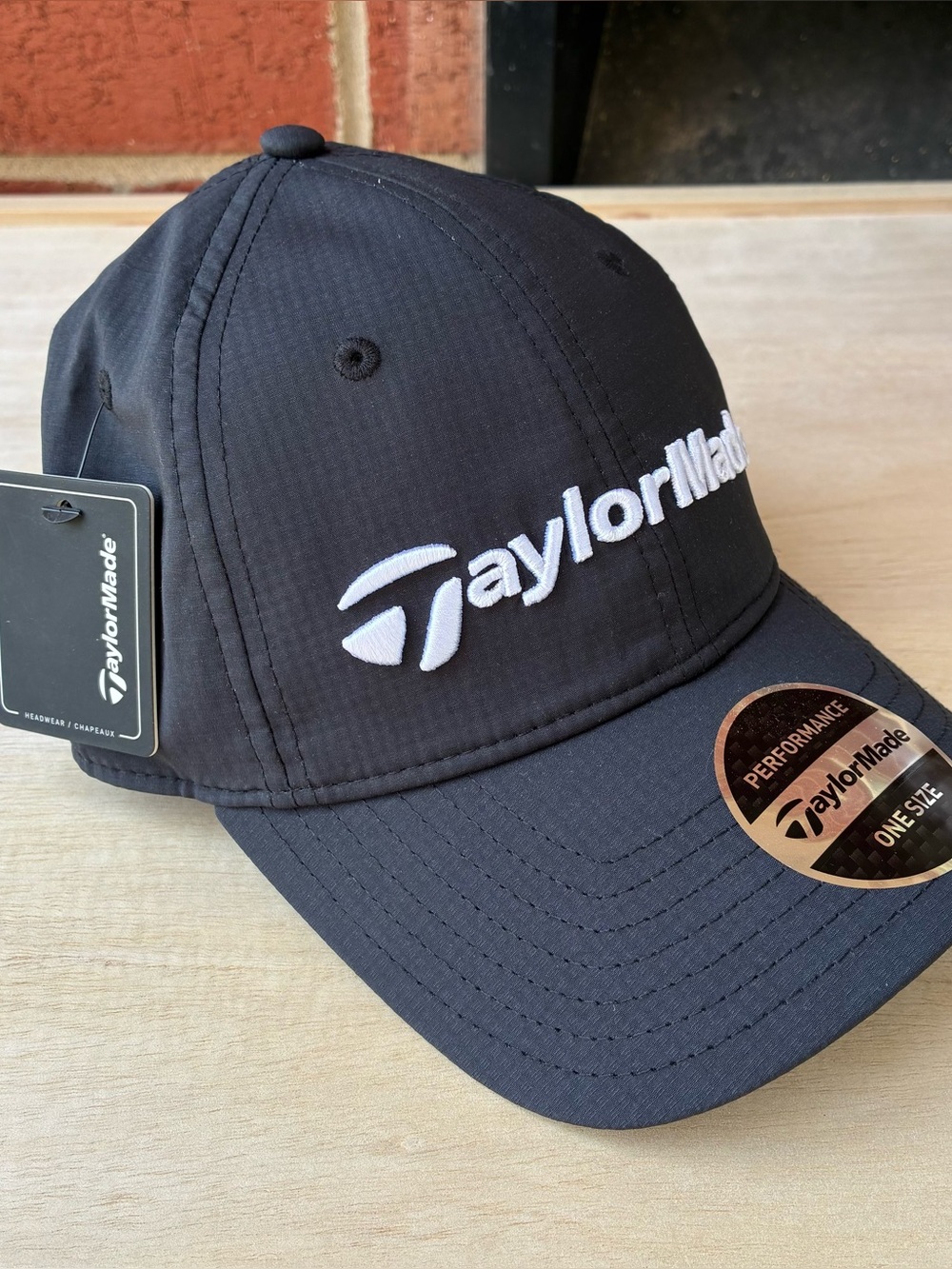 TaylorMade Performance Side Hit Black Adjustable Golf Hat UPF 50+